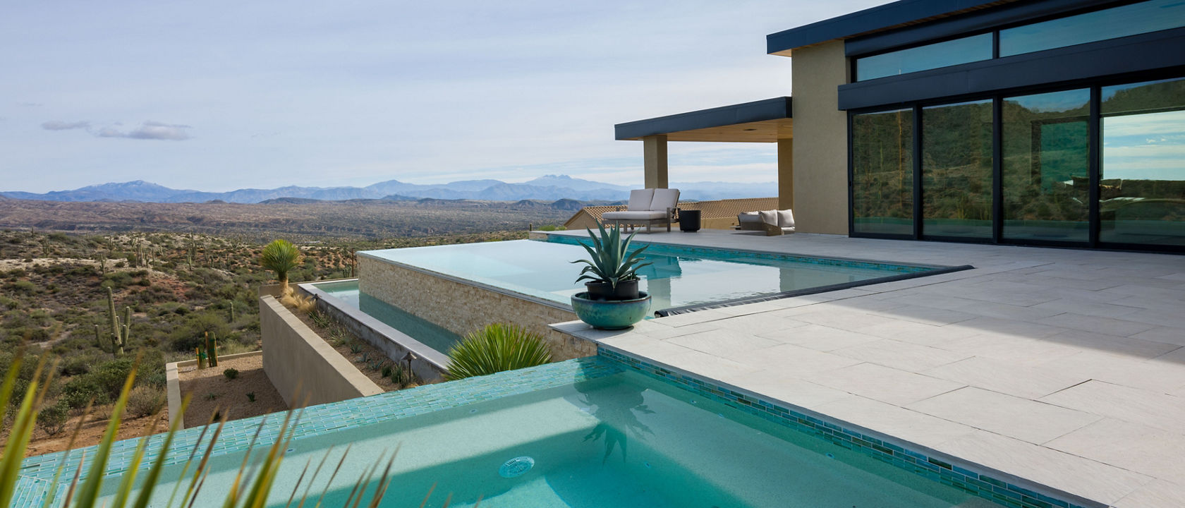 Infinity Pool Design Style with Quartz Countertops.