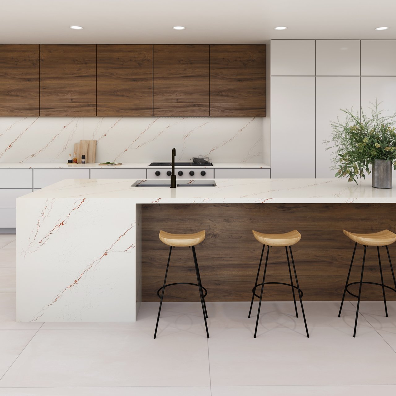 A stylish eat-in kitchen with Cambria Inverness Bronze quartz countertops and backsplash