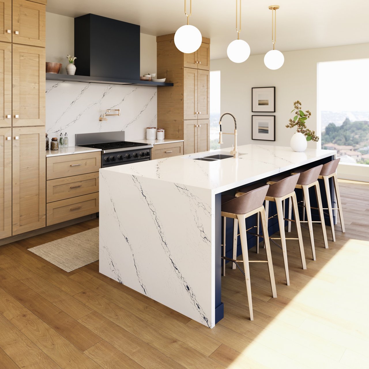 A beautiful tan and cream eat-in kitchen with Cambria Inverness Cobalt quartz countertops and backsplash