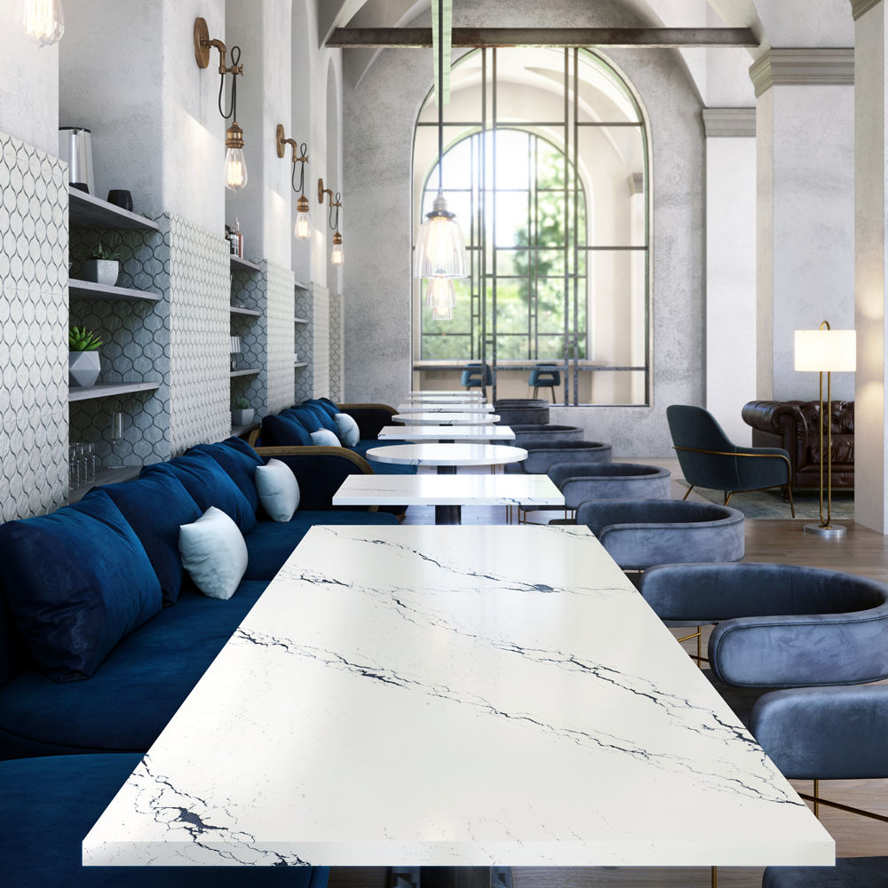 An elegant blue and cream workspace with Cambria Inverness Cobalt quartz tabletops