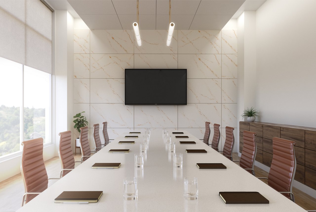 A beautifully ornate conference room with Cambria Inverness Gold quartz tabletop