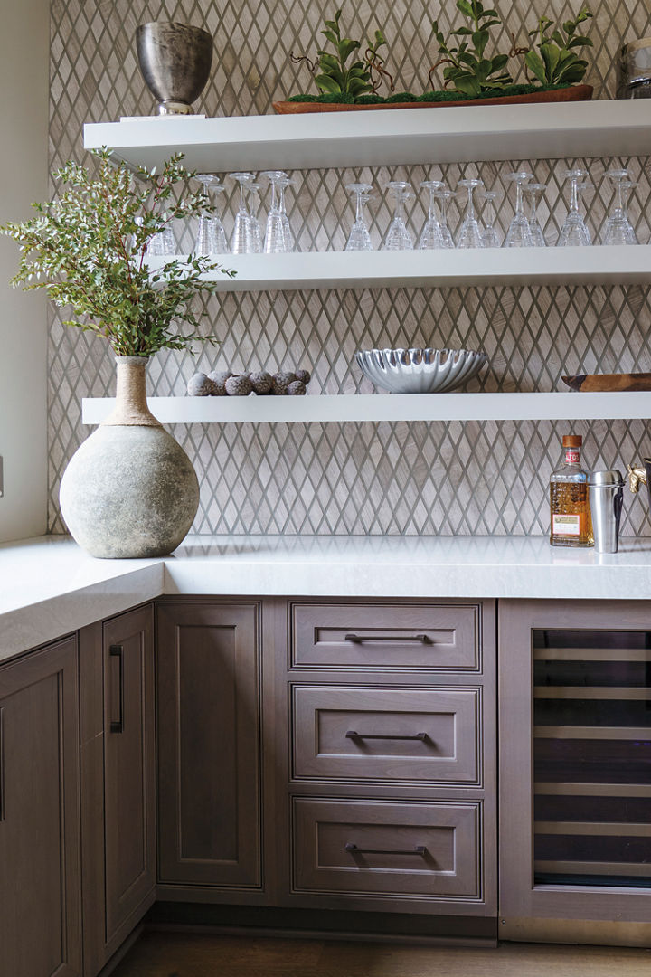 a kitchen with greige cabinets, white quartz countertops, a wine fridge, and open shelving