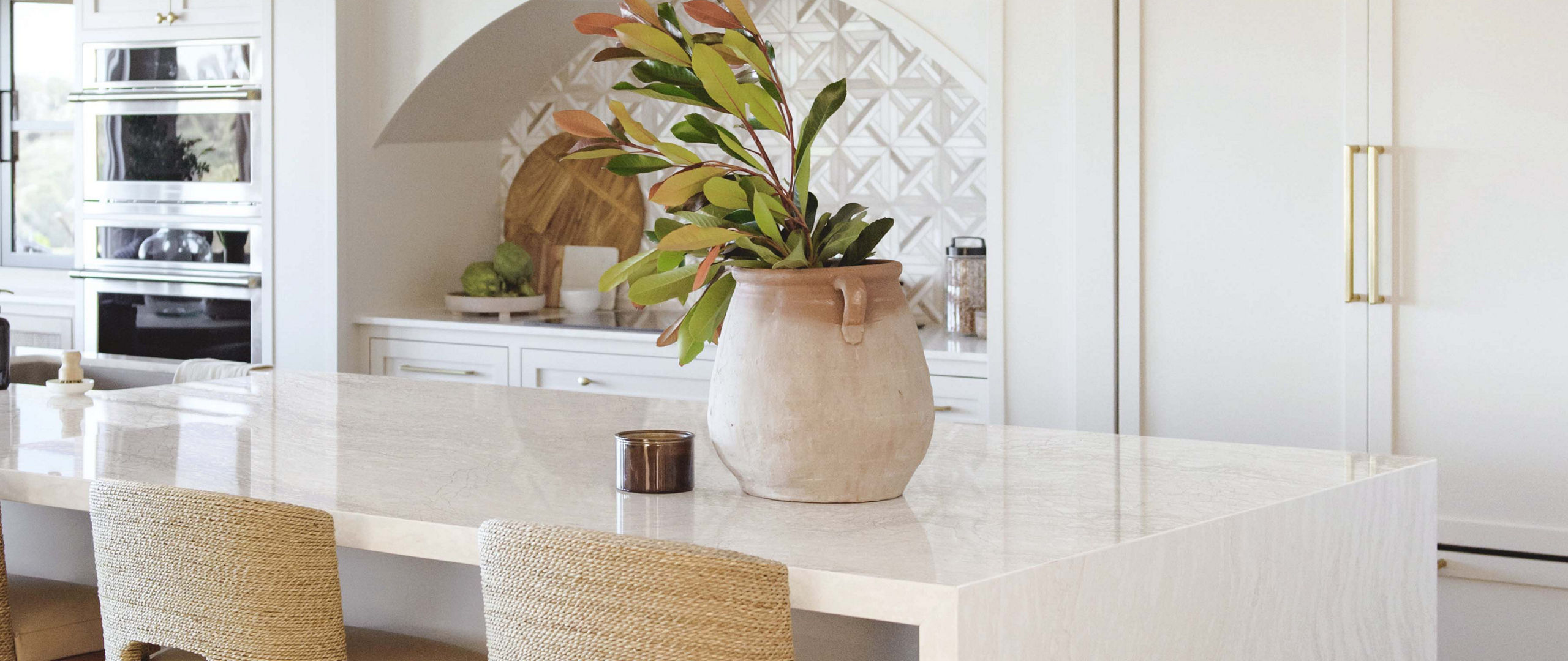 Ironsbridge quartz kitchen island with waterfall edge