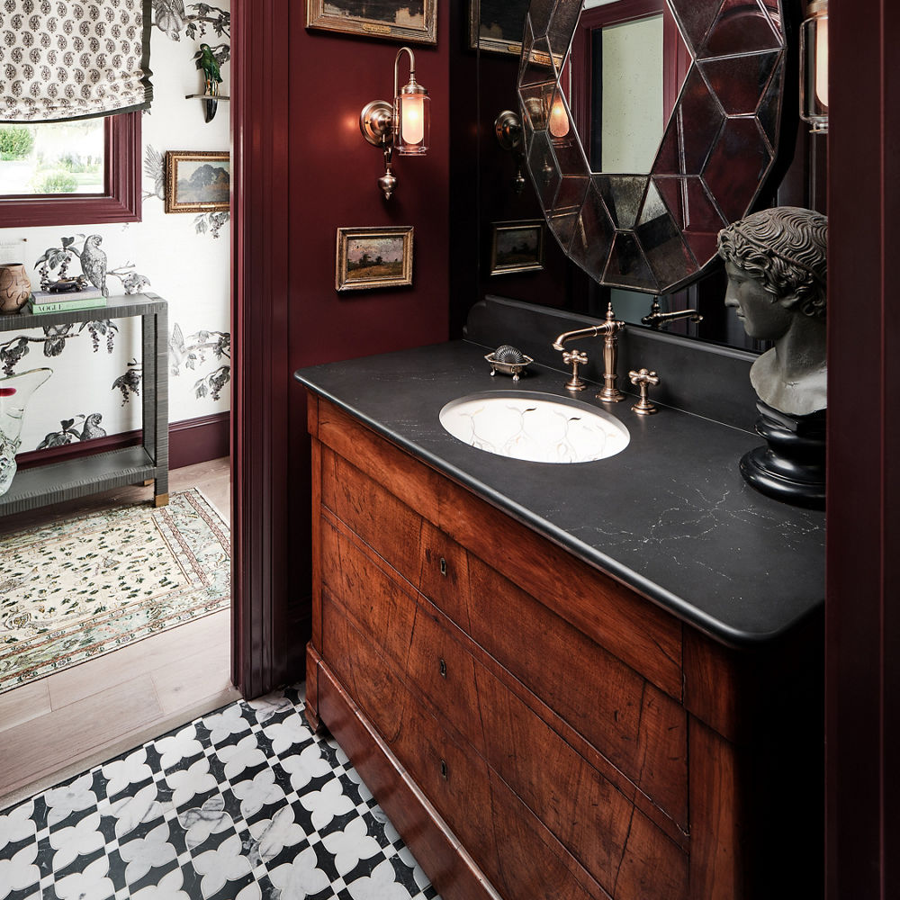 A deep dark toned bathroom with abstract details and a Mammoth Cave Matte quartz vanity