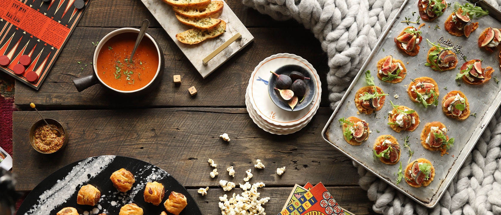 A moodboard setup featuring a Cambria Skara Brae quartz serving tray