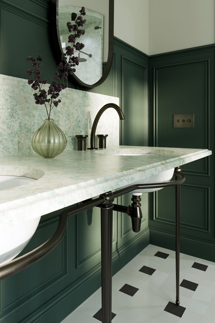 A green bathroom with Montgomery quartz countertops and backsplash