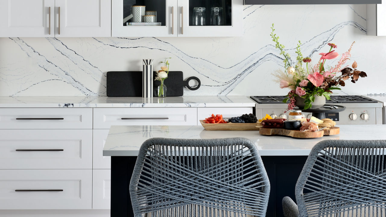 Light kitchen with Portrush quartz countertops and backsplash