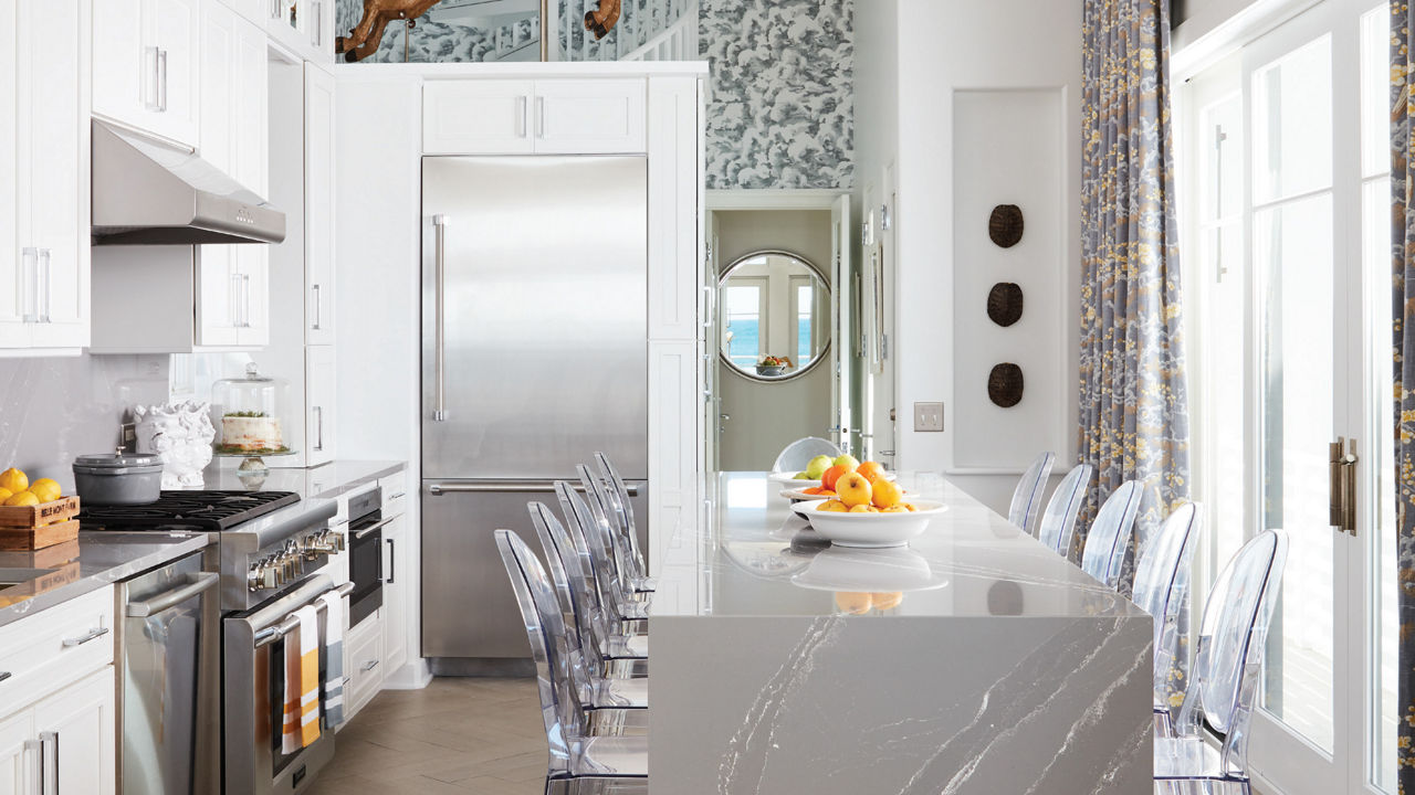 Cambria Queen Anne quartz kitchen waterfall countertop in kitchen designed by Vern Yip