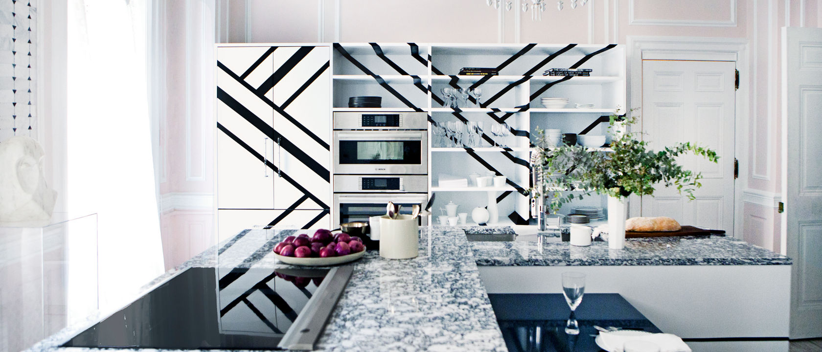 Cambria Rose Bay and Hadley quartz countertops in a kitchen featuring unique shapes.