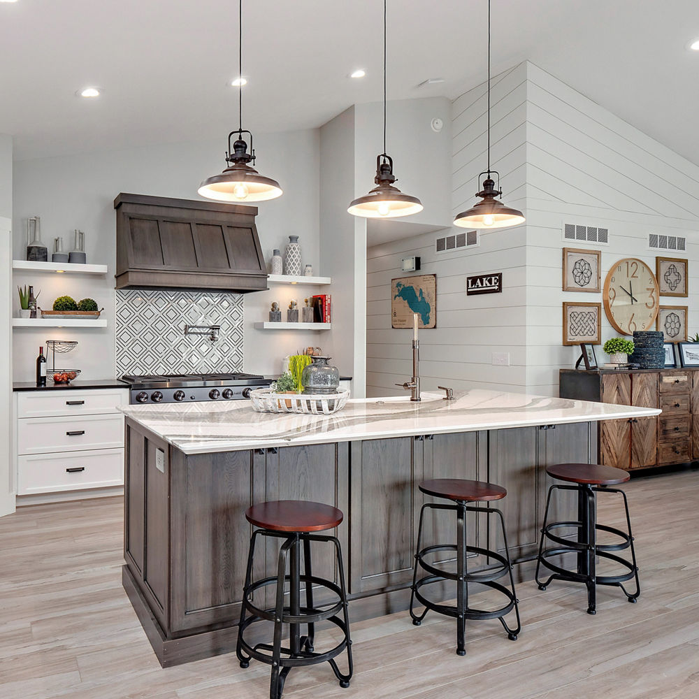 Kitchen featuring Skara Brae island and Cambria Black Matte perimeter.