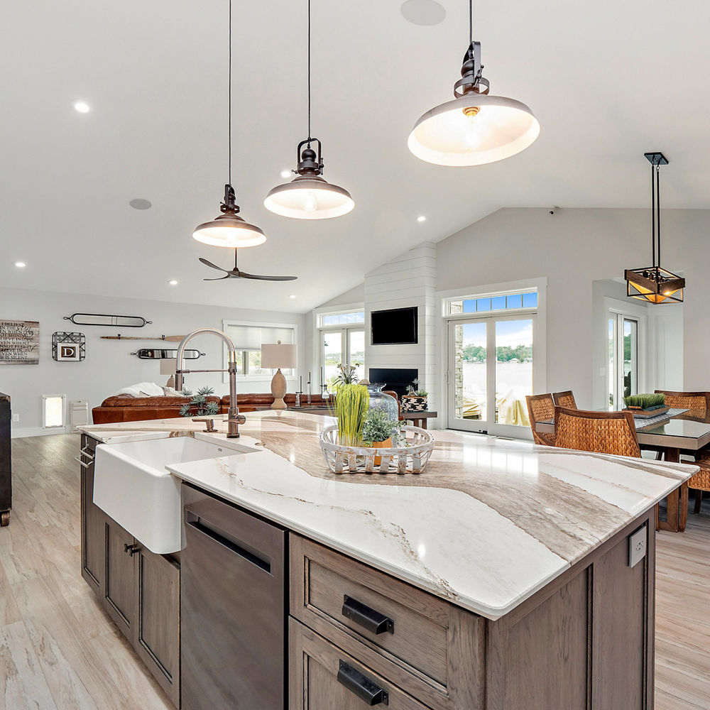 Kitchen featuring Skara Brae island and Cambria Black Matte perimeter.
