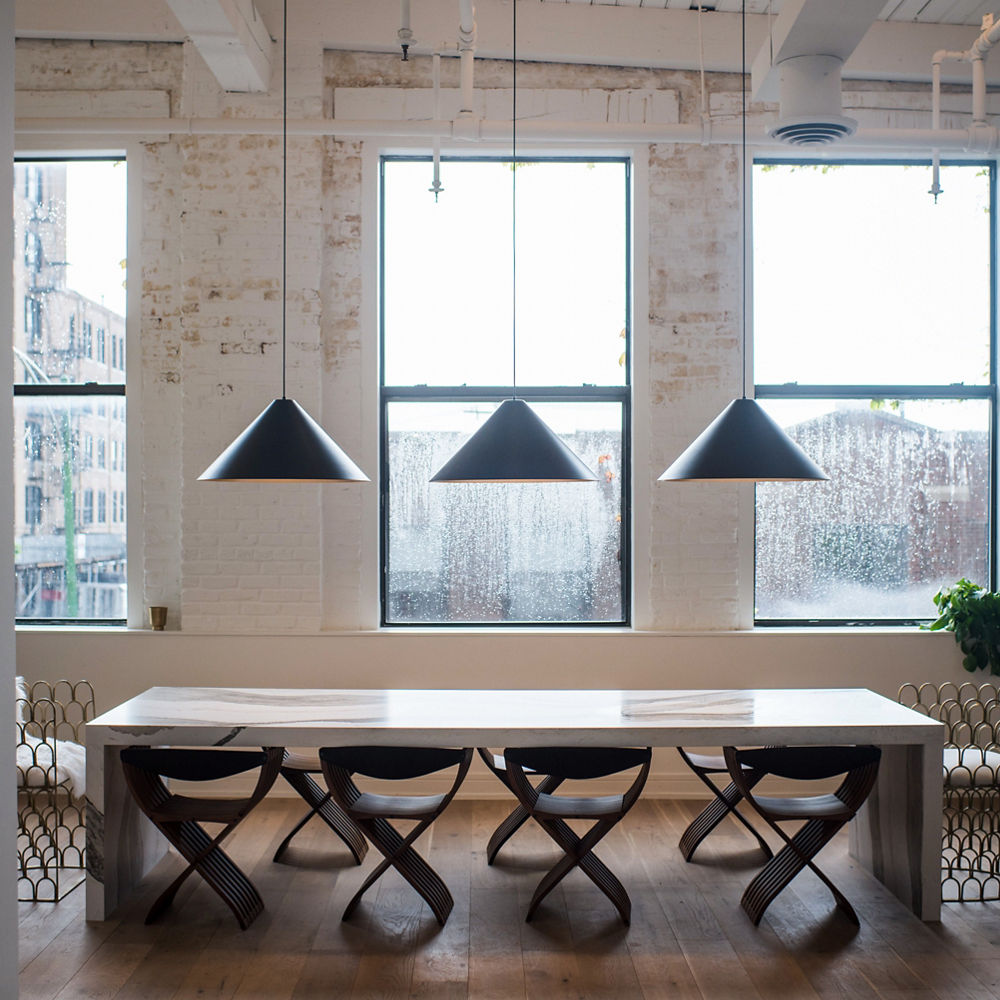 An open modern work area with Cambria Skara Brae workspace table