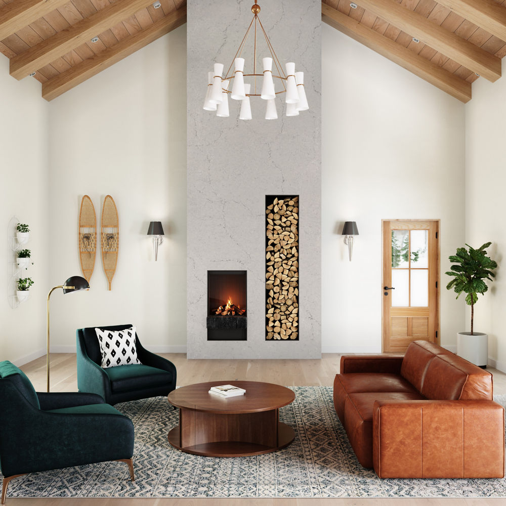 Living room with a coach and two chairs facing a roundtable across from a Cambria St. Giles quartz fireplace.