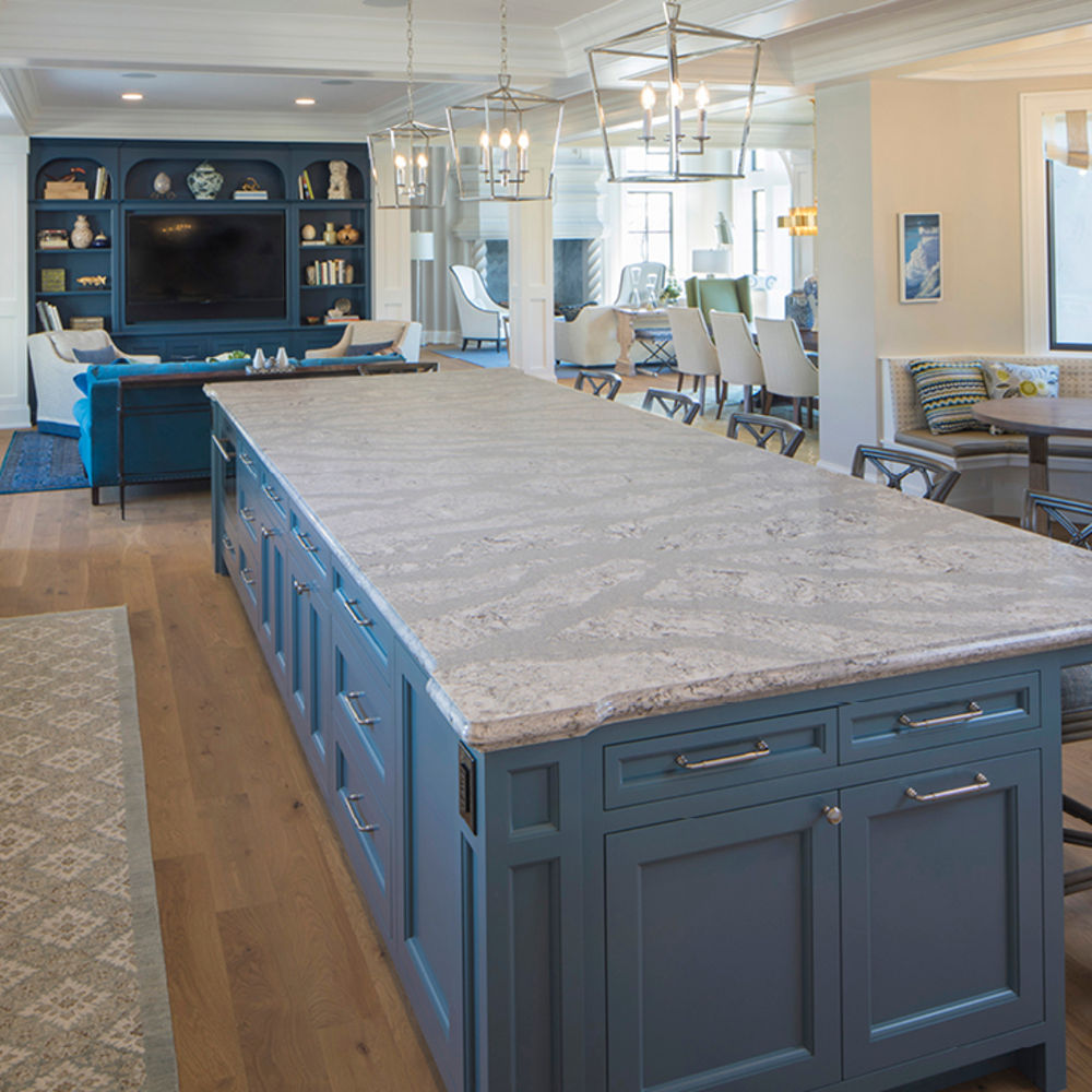 Cambria Summerhill quartz countertops in a blue themed kitchen