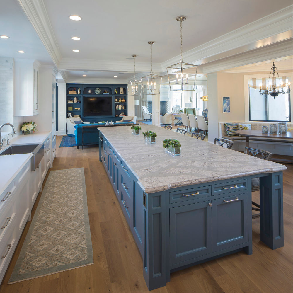 Open kitchen, dining, and living area with Summerhill quartz island kitchen countertops