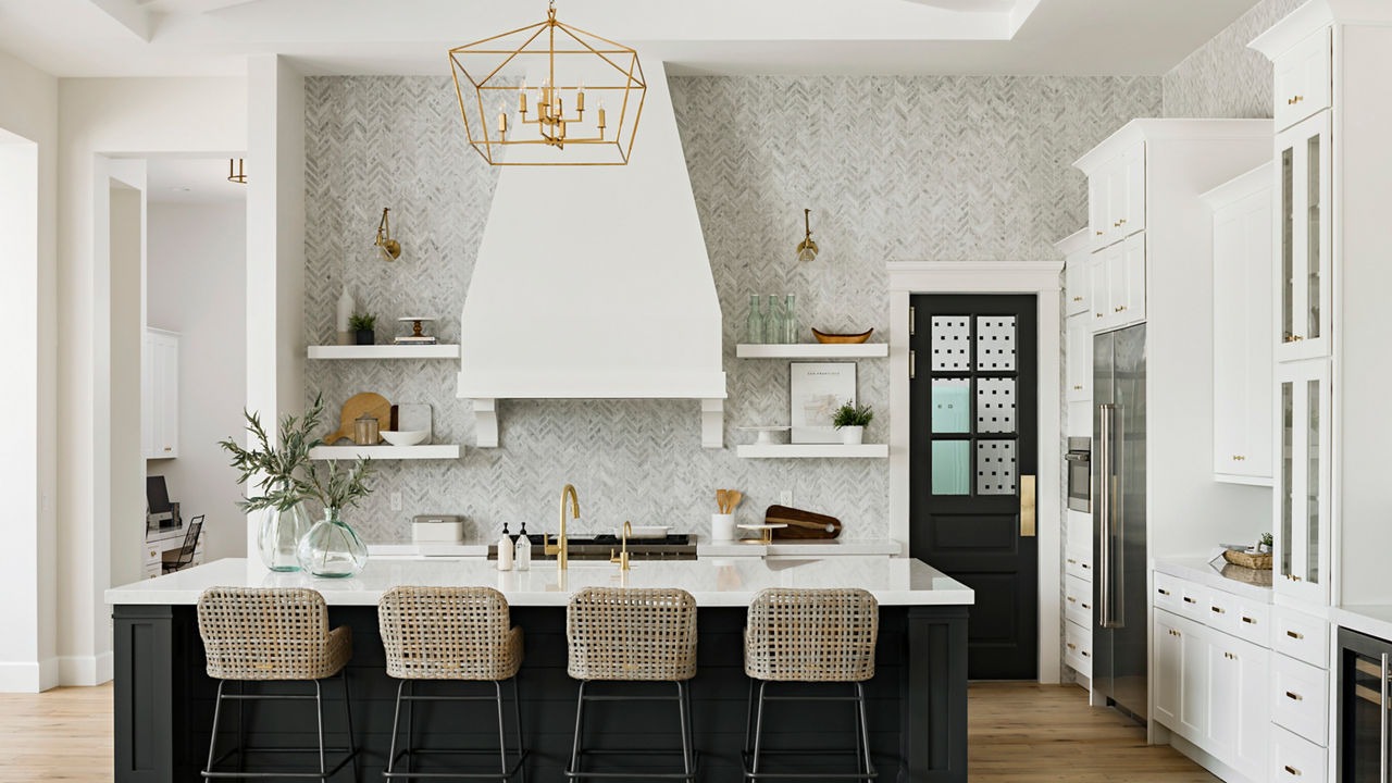 Bright white kitchen with a title wall backsplash and Swanbridge quartz countertops