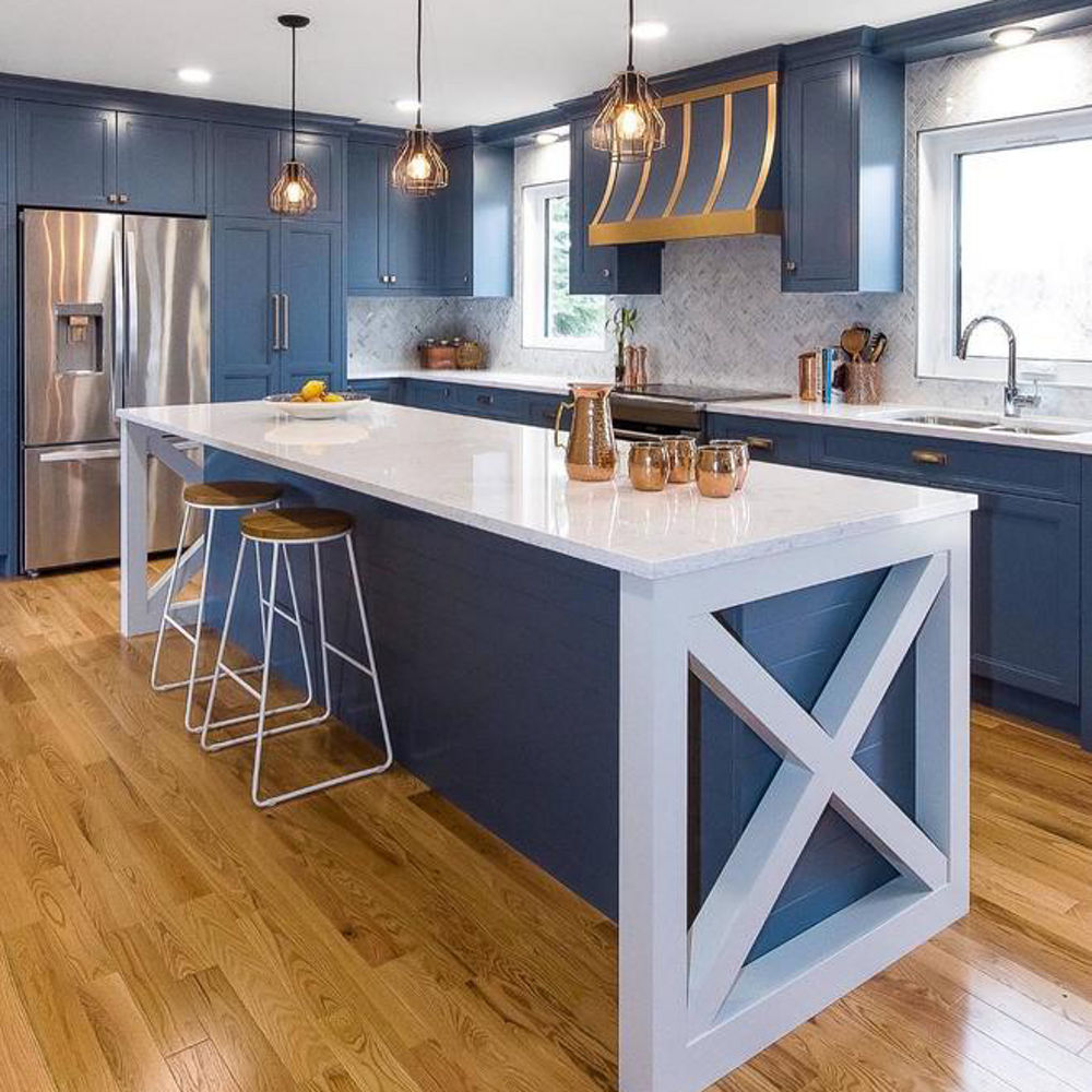 Slate blue and white kitchen featuring Swanbridge by Majestic Cabinets.