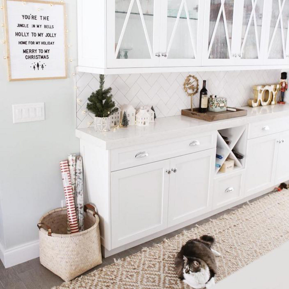 A holiday themed Kitchen with a decorative letter board