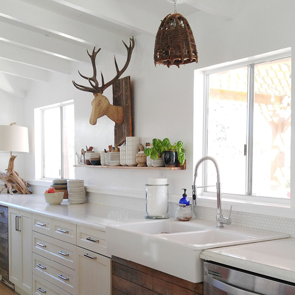 Double basin farmhouse sink, reclaimed wood, and Torquay countertops