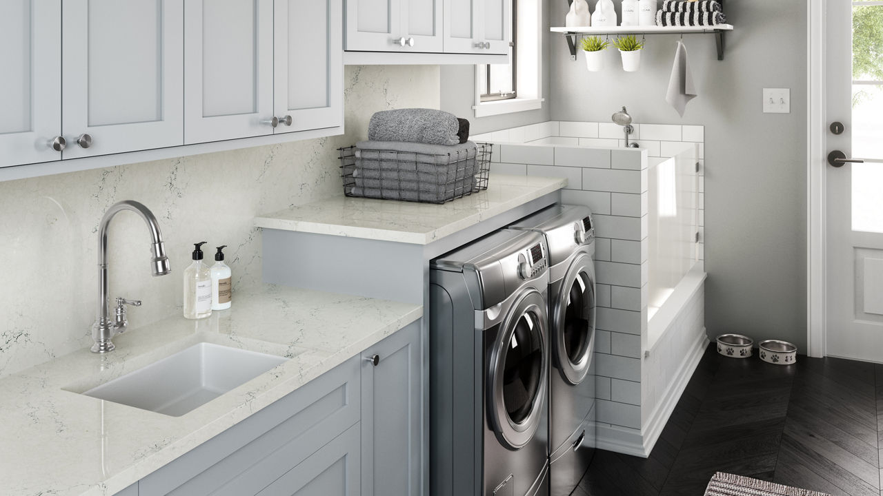 Travella quartz countertops in a light toned laundry room