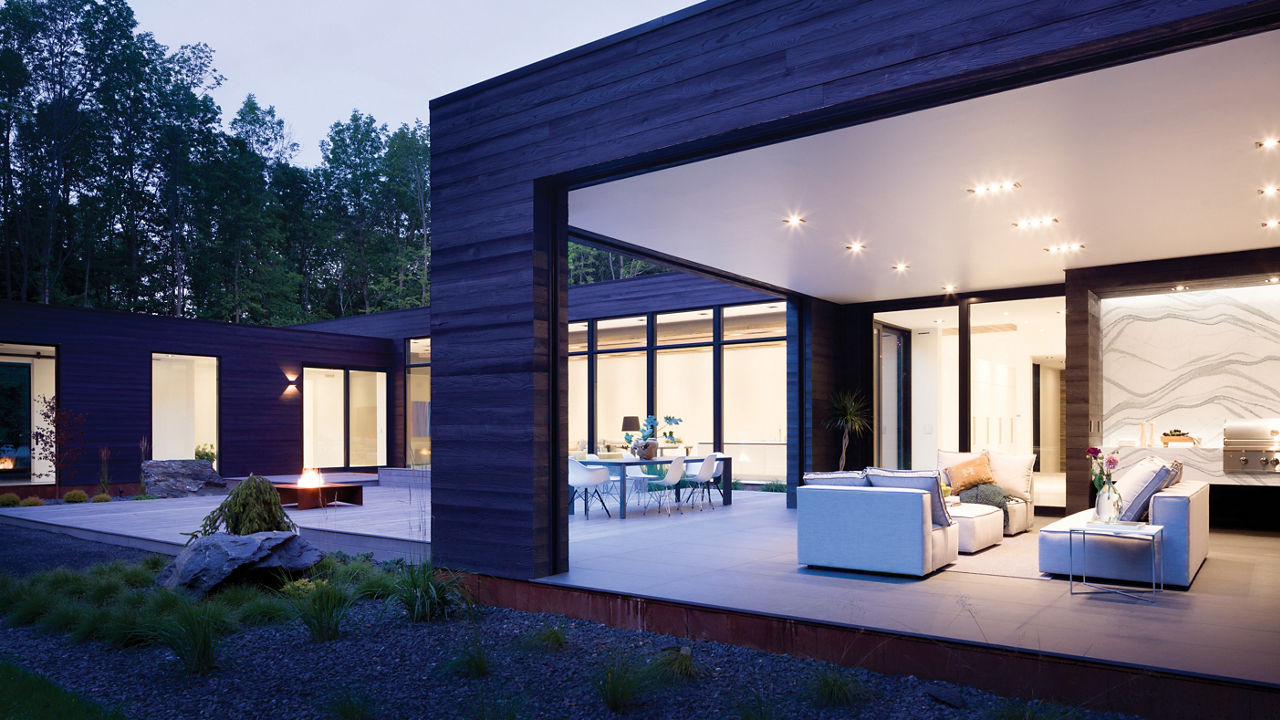 An exterior shot of a modern home featuring Cambria quartz countertops.