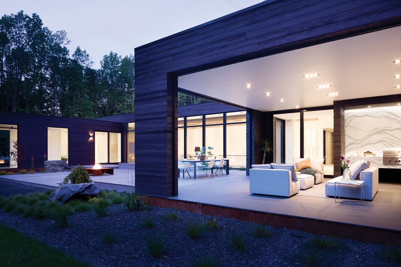 An exterior shot of a modern home featuring Cambria quartz countertops.