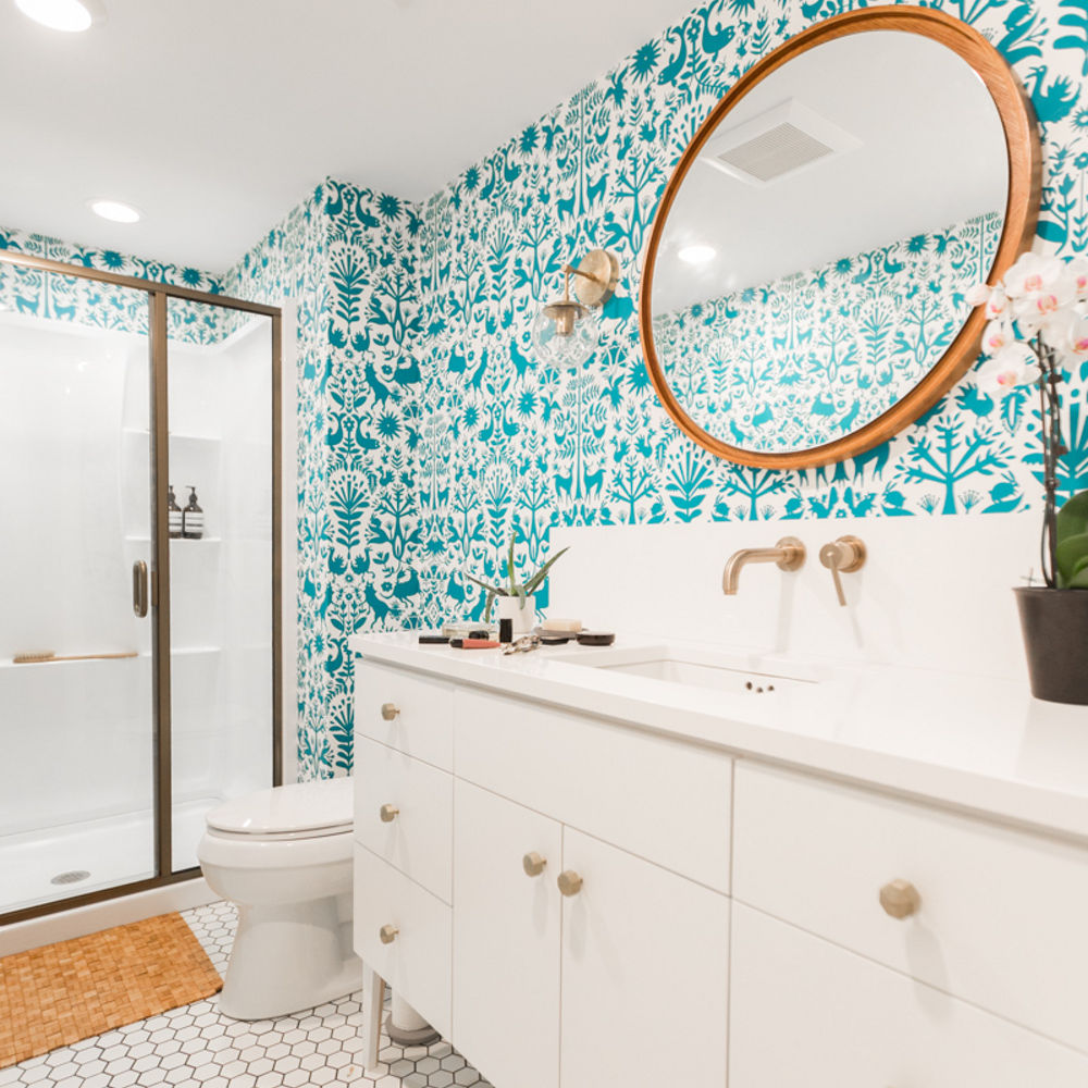 Bathroom with Patterned Wallpaper and a Cambria White Cliff Vanity Countertop